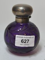 Modern silver mounted amethyst overlay cut glass perfume bottle, 9cm high the bottle has a stopper