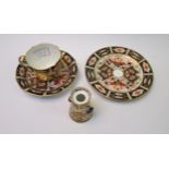 Royal Crown Derby Imari pattern trio and a similar miniature two handled vase