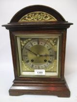 Edwardian oak mantel clock, the gilt dial with a silvered chapter ring, Arabic and Roman numerals,