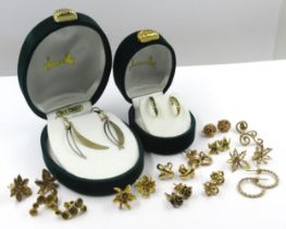 Twelve pairs of various 9ct gold mounted earrings, gross weight 26.4g, together with two boxed pairs