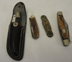 Four various folding knives, including a Laguione with leather case and a Premium Stock knife