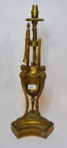 Late 19th / early 20th Century ormolu lamp base in the form of three Bacchus busts surrounding a