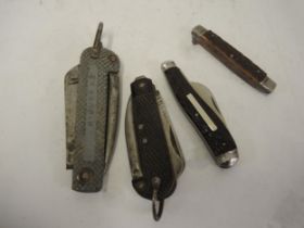 Four various folding knives, including George Wostenholm