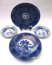 Pair of Chinese blue and white shallow bowls, decorated with birds in foliage, 21.5cm diameter,