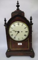 Regency rosewood bracket clock, the Gothic style arched case with gilt brass mounted cluster