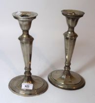 Pair of silver plated candlesticks and a large floor standing candelabra