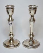 Pair of Birmingham silver candlesticks (filled), 20cm high