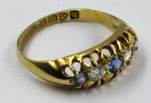 18ct Yellow gold ring set two diamonds and three sapphires, size J, 2.3g