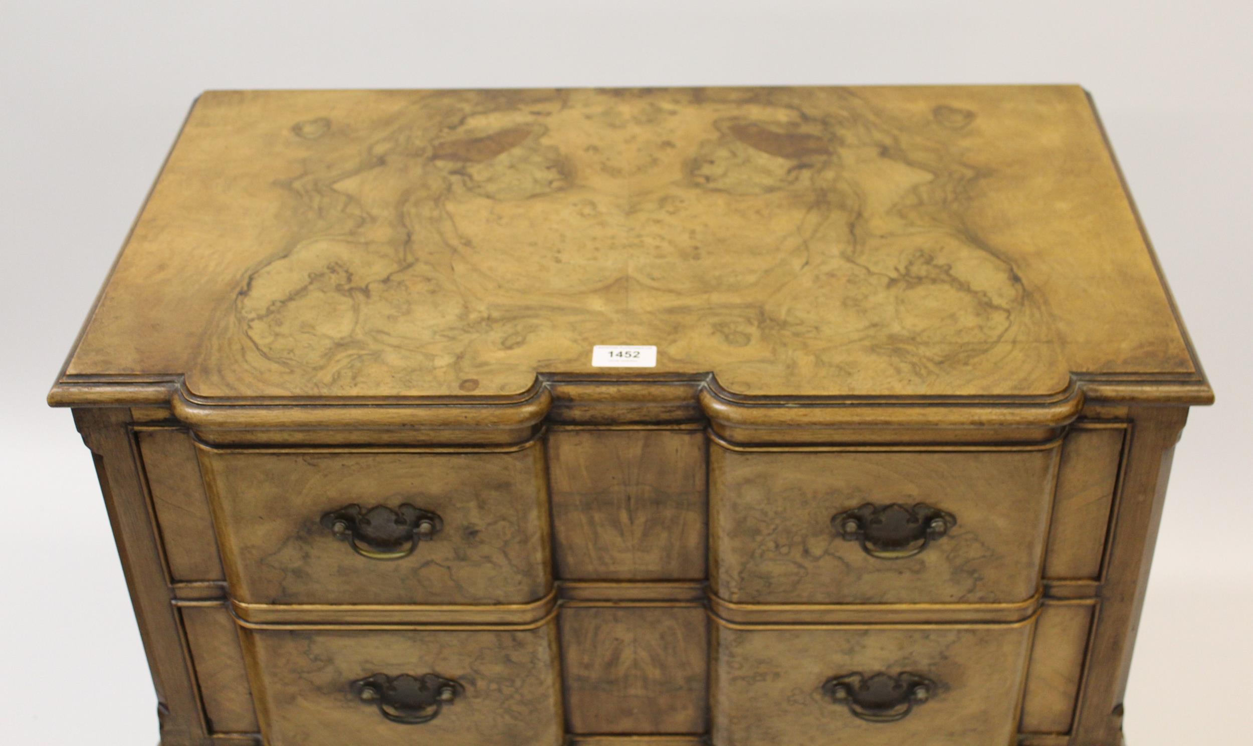 1930's Walnut lowboy in 18th Century style, the inverted breakfront moulded top above two drawers, - Image 2 of 2