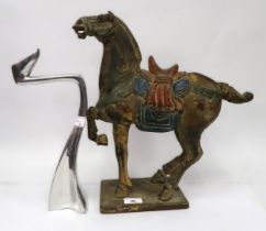 Chinese carved and painted wooden figure of a horse, together with a modern aluminium candlestick