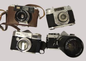 Quantity of 35mm cameras with lenses including a Braun Paxette Reflex and an Olympus OM-1N