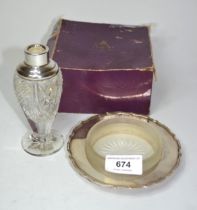 Silver butter dish by Asprey, together with a silver mounted perfume bottle