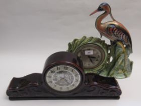 Unusual porcelain mantel clock in the form of a heron with lustre finish, together with another