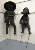 Gail Runyon Perry, pair of bronzed resin garden sculptures of children gardeners, the tallest 88cm