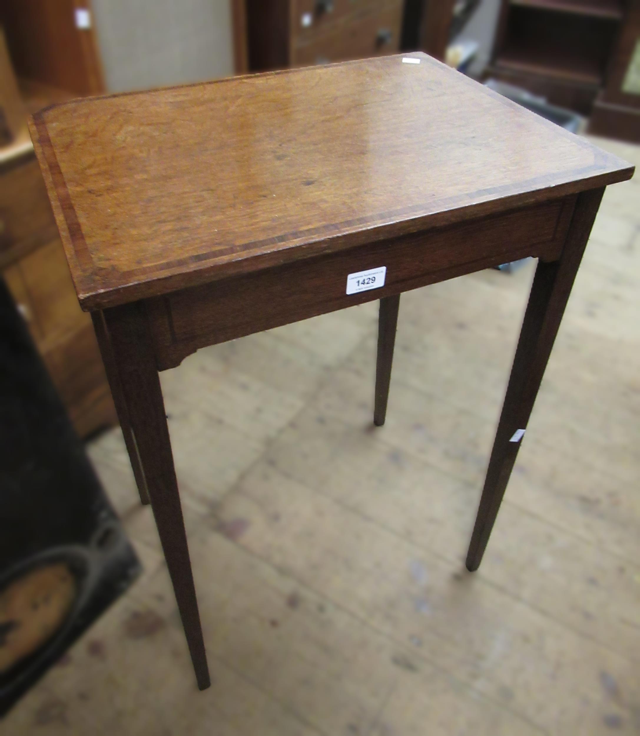 Oak and mahogany crossbanded side table on square tapering supports together with a 20th Century