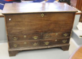 George III Oak mule chest with hinged cover, fitted with a candlebox above four short drawers,