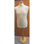 Modern mannequin torso on beechwood stand