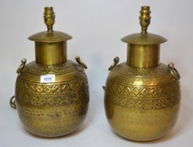 Pair of embossed brass table lamps with shades, together with a Satsuma pottery table lamp, with