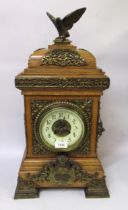 Large 19th Century oak and gilt brass mounted bracket clock with eagle surmount, the circular dial