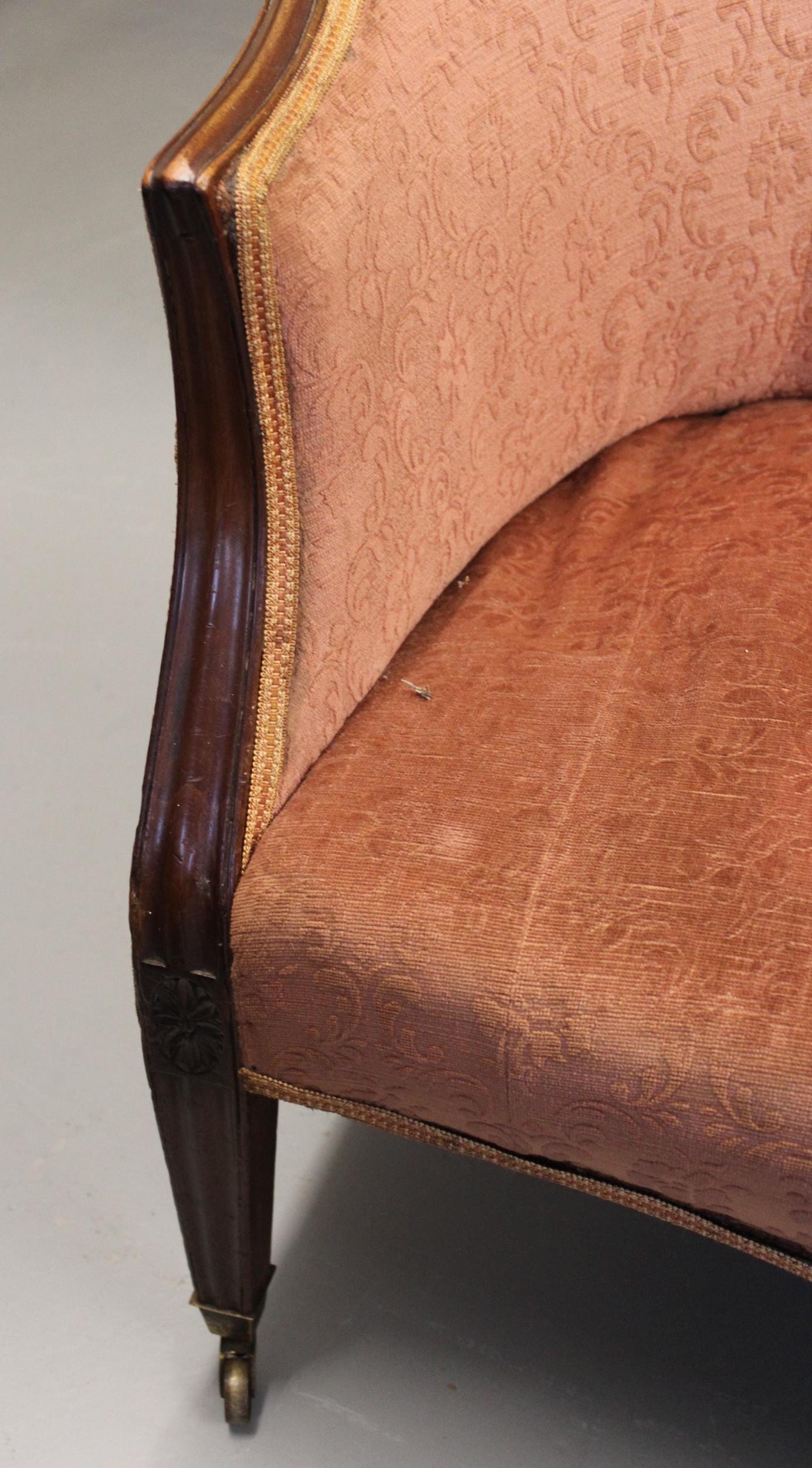 George III mahogany humpback sofa with moulded frame on square reeded supports with later casters, - Image 2 of 3