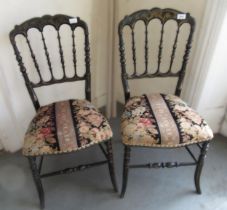 Pair of 19th Century black painted side chairs with gilded decoration