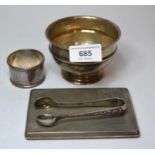 Birmingham silver pedestal bowl, silver napkin ring, pair of sugar tongs and a silver cigarette case