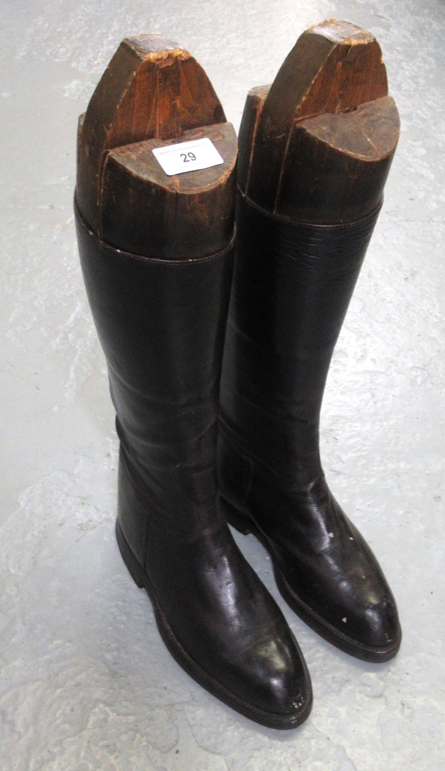 Pair of black leather riding boots with trees soles measure 29.5cm long and 10cm at the widest part