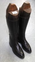 Pair of black leather riding boots with trees soles measure 29.5cm long and 10cm at the widest part