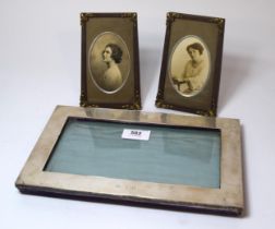 White metal photograph frame inscribed with an 'M' and the date 16-4-16 together with two 1920's