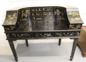 20th Century ebonised and chinoiserie decorated Carlton House desk, the galleried back having an