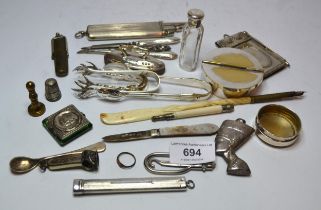 Quantity of small silver and silver plated items, including sugar tongs, fruit knife and a scissor