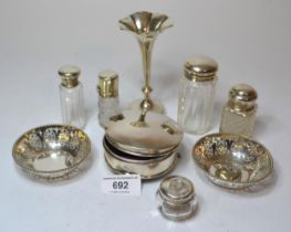 Circular silver trinket box, silver spill vase, pair of silver circular pierced dishes and five