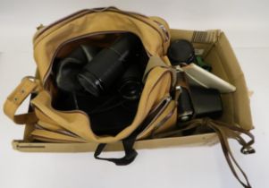 Russian Zenit camera, together with a quantity of various lenses including Takumar, Vivitar and