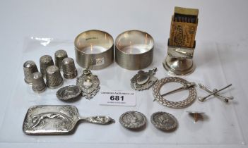 Pair of silver engine turned napkin rings, various miniature items of silver including thimbles,
