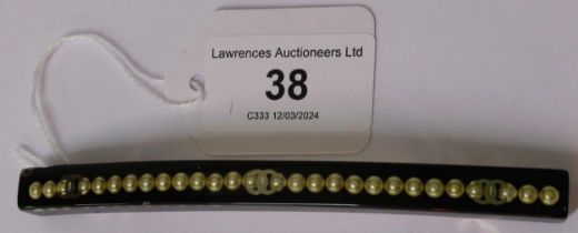 Chanel, black resin and faux pearl inset hair slide, 11.5cm long, (chip to resin at one end)