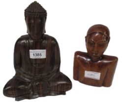 Carved exotic hardwood figure of seated Buddha, together with another carved wooden bust, Buddha