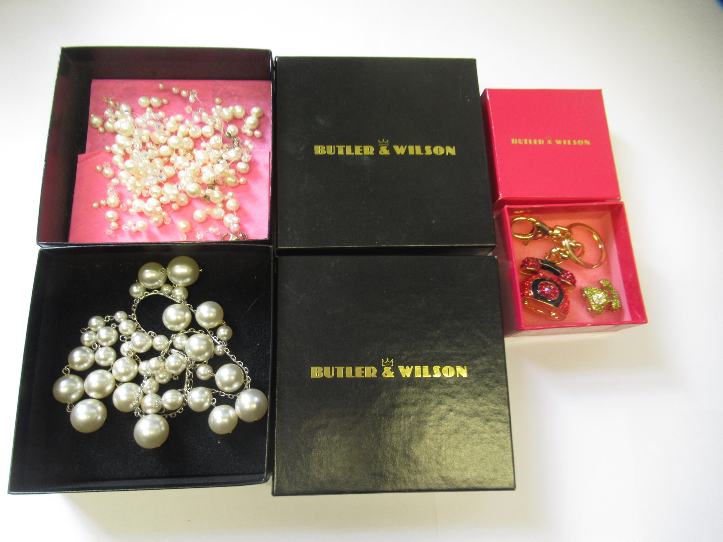 Butler & Wilson simulated pearl necklet in original box, together with another similar necklet, a