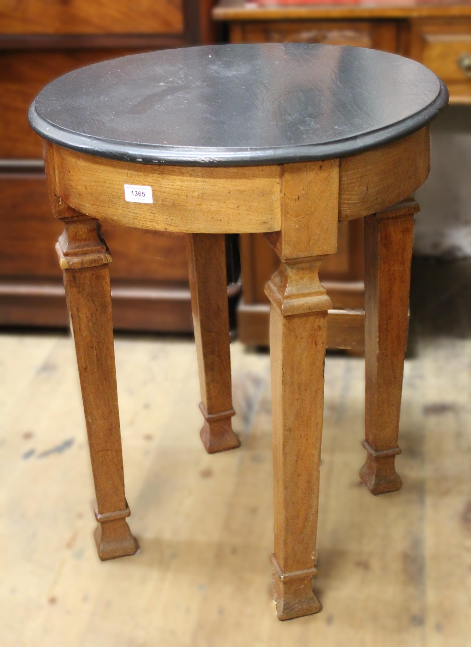 Continental circular ebonised topped and walnut occasional table, 76cm high x 60cm diameter