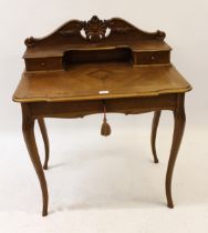 Small 20th Century French kingwood writing desk having galleried back, with two drawers above a