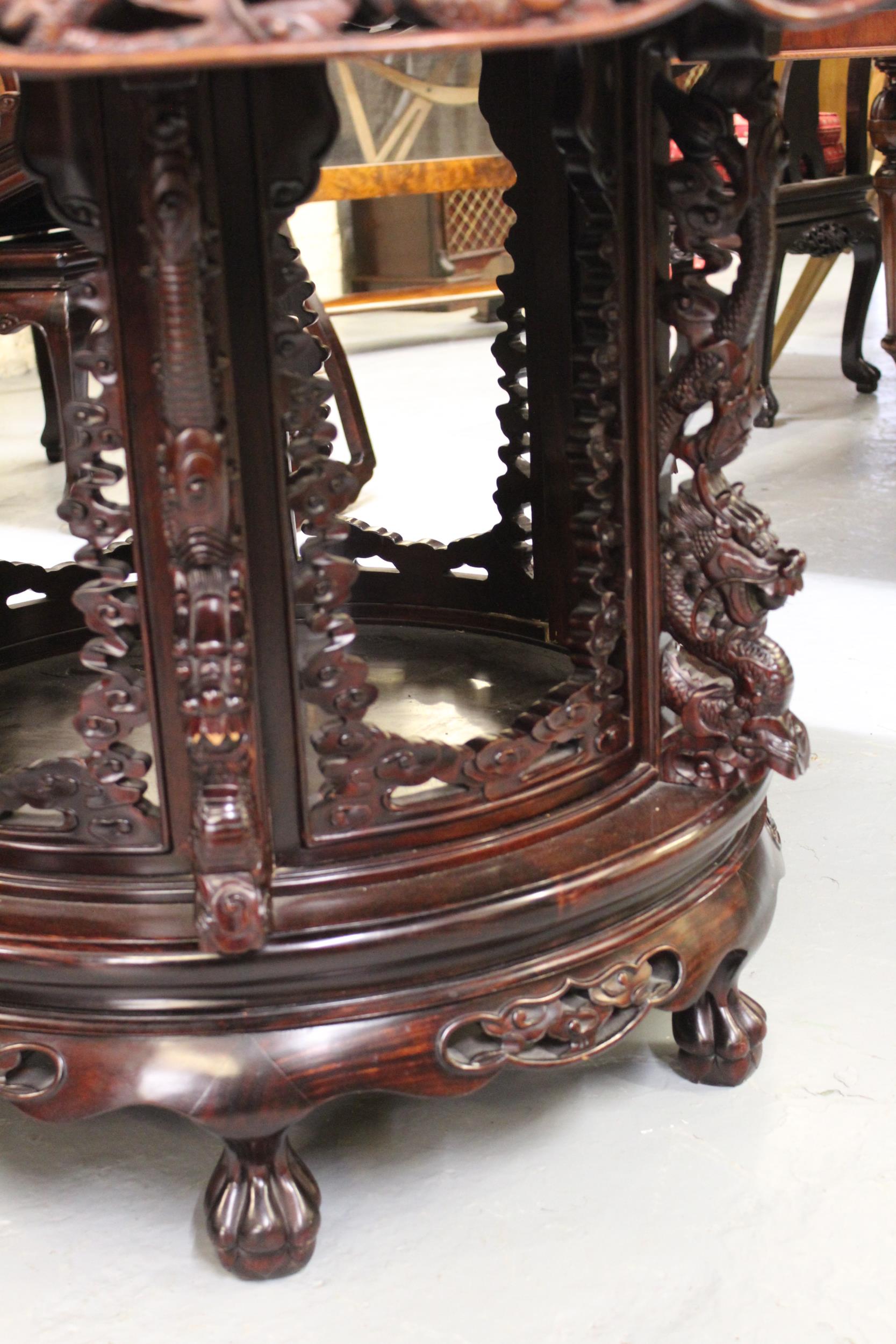 Good quality Chinese hardwood centre table with carved and pierced frieze, raised on a carved base - Image 3 of 3