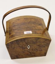 Regency burr yew and inlaid sewing box, the dome lid and swing handle enclosing a void interior (