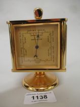 Inhof gilt brass four dial clock / thermometer / barometer / hygrometer, 12cm high