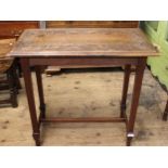 Arts & Crafts rectangular mahogany occasional table with carved top, raised on square tapering