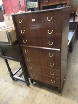 Mid 20th Century G Plan teak chest of seven drawers with gilt brass handles