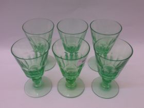 Set of six pale green tinted glass pedestal goblets