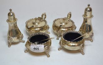 Modern London silver six piece condiment set in antique style with four spoons and various glass