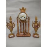 French rouge marble and ormolu mounted three piece clock garniture having circular enamel dial