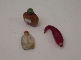 Group of three various Chinese moulded glass snuff bottles Various small chips to all three bottles