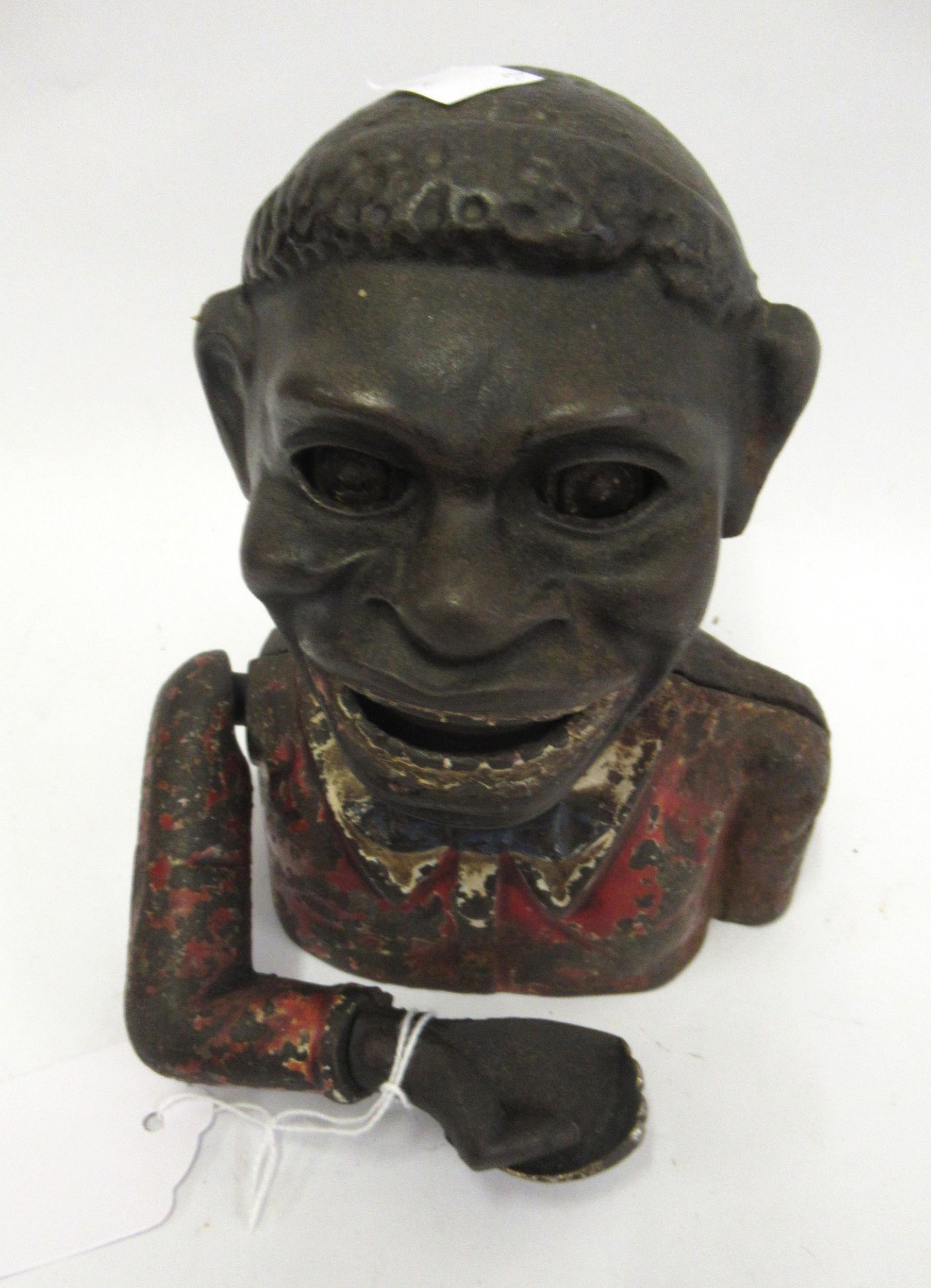 Late 19th / early 20th Century plaster charity money box in the form of a seated child with a - Image 2 of 2