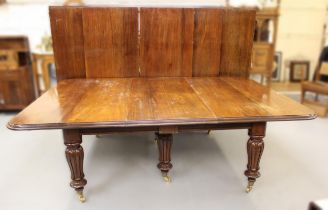 Large 19th Century and later mahogany pull-out extending dining table, the moulded top with six